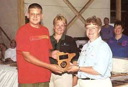 15 yr old Paul receiving MN Best Award at World Pork Expo 2000.