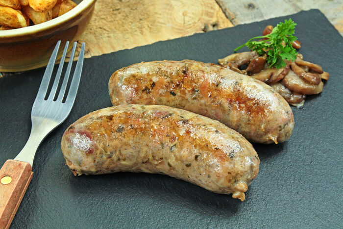Grilled,andouillettes,on,a,slate