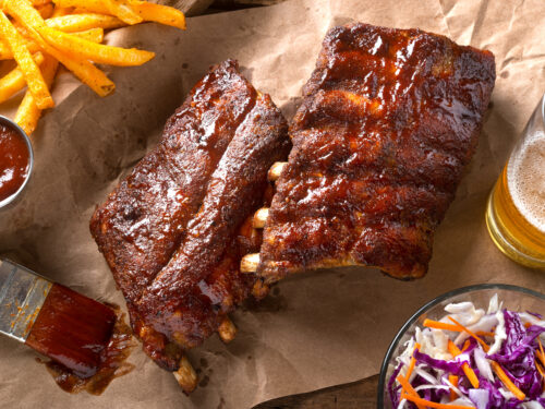 A,rack,of,delicious,baby,back,ribs,with,barbecue,sauce,