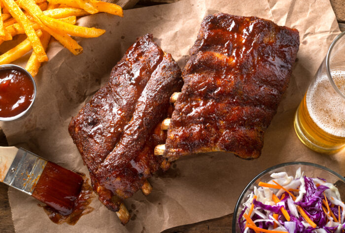 A,rack,of,delicious,baby,back,ribs,with,barbecue,sauce,